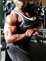 super hot ebony female bodybuilder mistress treasure in ripped contest shape